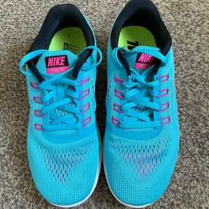 Womens Nike Free RN running shoes, turquoise, size 7.